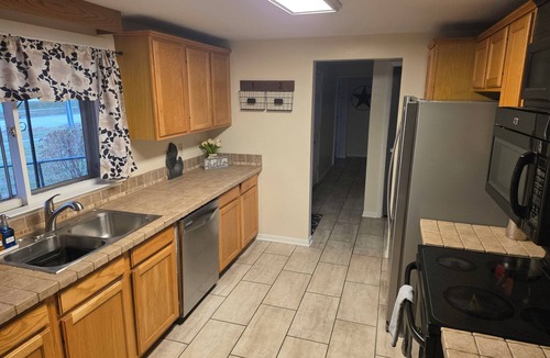 Midland House | Parkside 5-Bedroom Home with Fireplace and Game Room