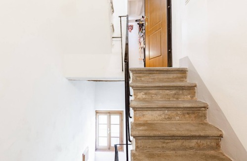 San Francesco Apartment | Piazza dei Cavalieri Orange Attic Apartment