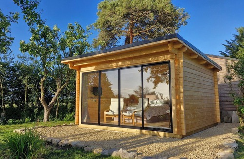 Chippenham Cabin | Private, air-conditioned log cabin, with field views, own garden and shower room