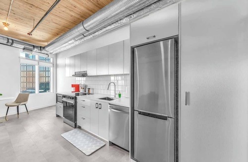 East Village Apartment | Rooftop Oasis w/River Views & Sauna Access
