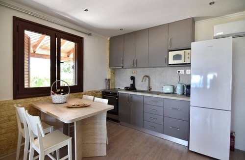 Ormos Panagias Villa | Spacious beachfront retreat with large garden in Ormos Panagias