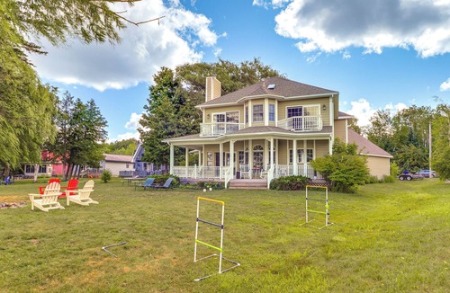 Traverse City Cottage | Spacious Lake Leelanau Cottage w/Fire Pit!