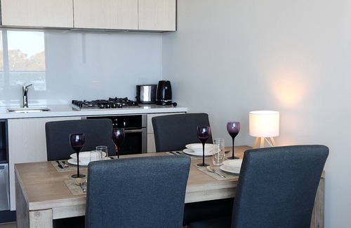 Cheltenham Apartment | Stylish two-bedroom stay near Southland, beach, cafés, dining, and trains.