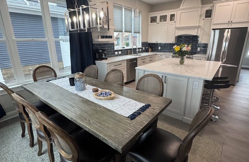 Russells Point House | SUNSET RETREAT-Luxury 4BR, 4.5BA waterfront, boat lift, best sunset on the lake!