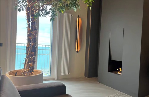 Fano Apartment | Super Beachfront Penthouse for Families with Breakfast, 2 Parking Spaces, Private Beach