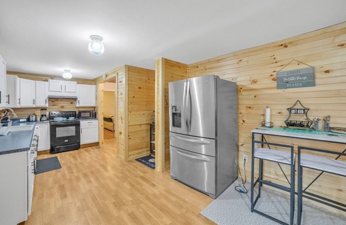 Grand Junction House | The Wolf Den : Jump into Summer Fun – Lakefront Bliss Awaits!