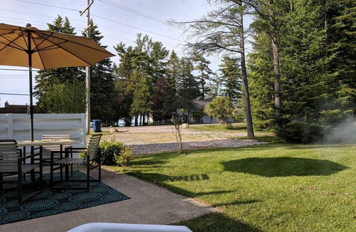 Rapid City Cottage | TORCH LAKE SANDBAR -directly across the street-