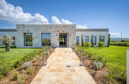 Almiros Beach Villa | Villa Serenissima - Beachfront Villa with Indoor & Outdoor Pools and Gym by Posarelli Villas