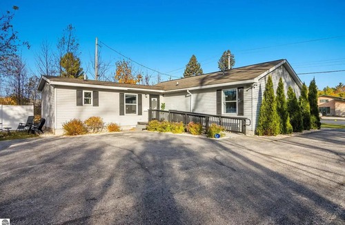 Elk Rapids House | Walking distance to local eateries, watering holes, beaches, grocery & shopping!