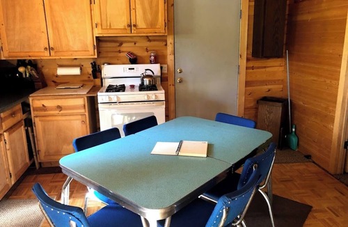Skanee House | Welcoming off Grid 2-bedroom Cabin in Skanee. On the Big Huron River Fish camp!