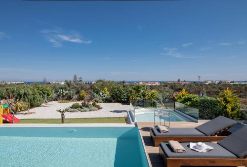 Alba Bianca Villa, Family Retreat with Heated Pool By ThinkVilla