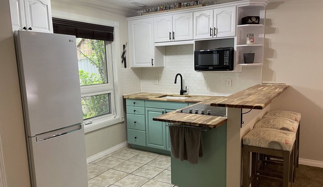 Bright walkout suite in the beautiful community of Suntree.