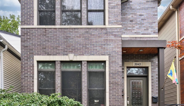 Entire Home in Historic Logan Square with private backyard, parking available.