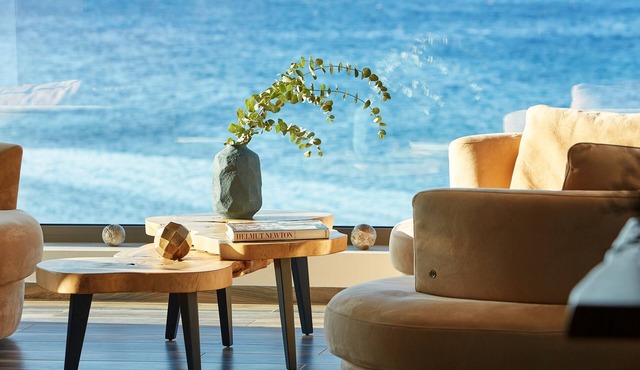 Exclusive beachfront penthouse retreat with private hot tub