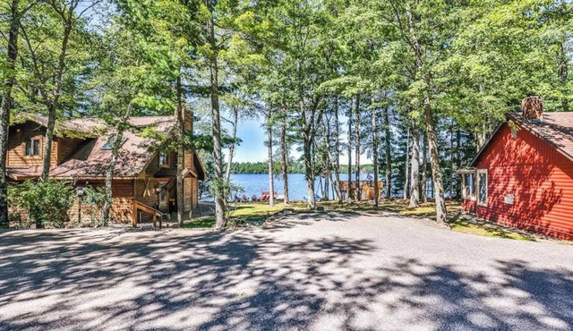 Lakefront retreat with two full kitchens, fireplaces, washer/dryer, & two docks