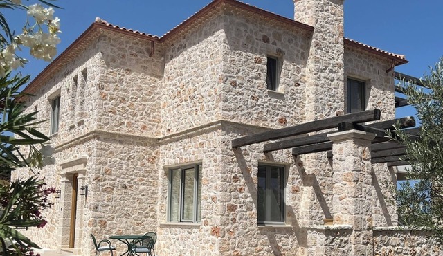 Luxury modern Villa, nestled on the mountain side with panoramic sea view.