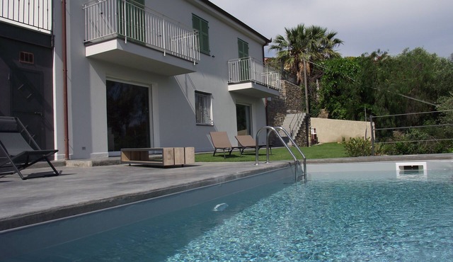 Modern elegant villa private pool terrace overlooking the sea and mountains