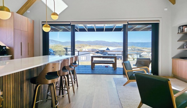 Mountain Views ~Balcony w BBQ ~ Elevator + Accessibility Friendly ~ Garage