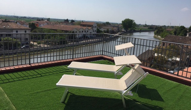 Palazzo Spada - App. Flamingo penthouse with terrace overlooking the Po River