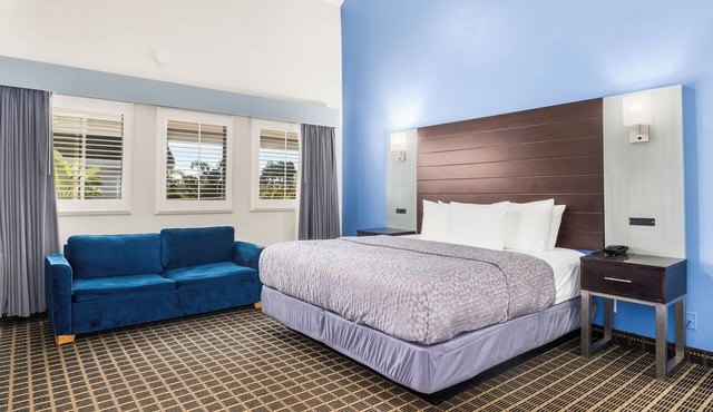 Superior King Room + Sofa Bed | Oversized Soaking Tubs | Near Santa Cruz Beach