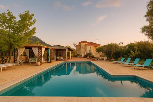 Villa Vlassoula - Beachfront Luxury Villa with Private Pool & Garden Heaven