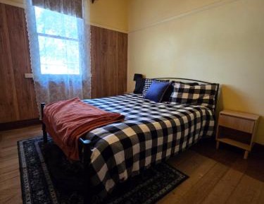 Queen Room with Shared Bathroom