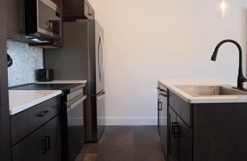 Indian River Condo | New Downtown 2BR Condo at Inn Between Rest.